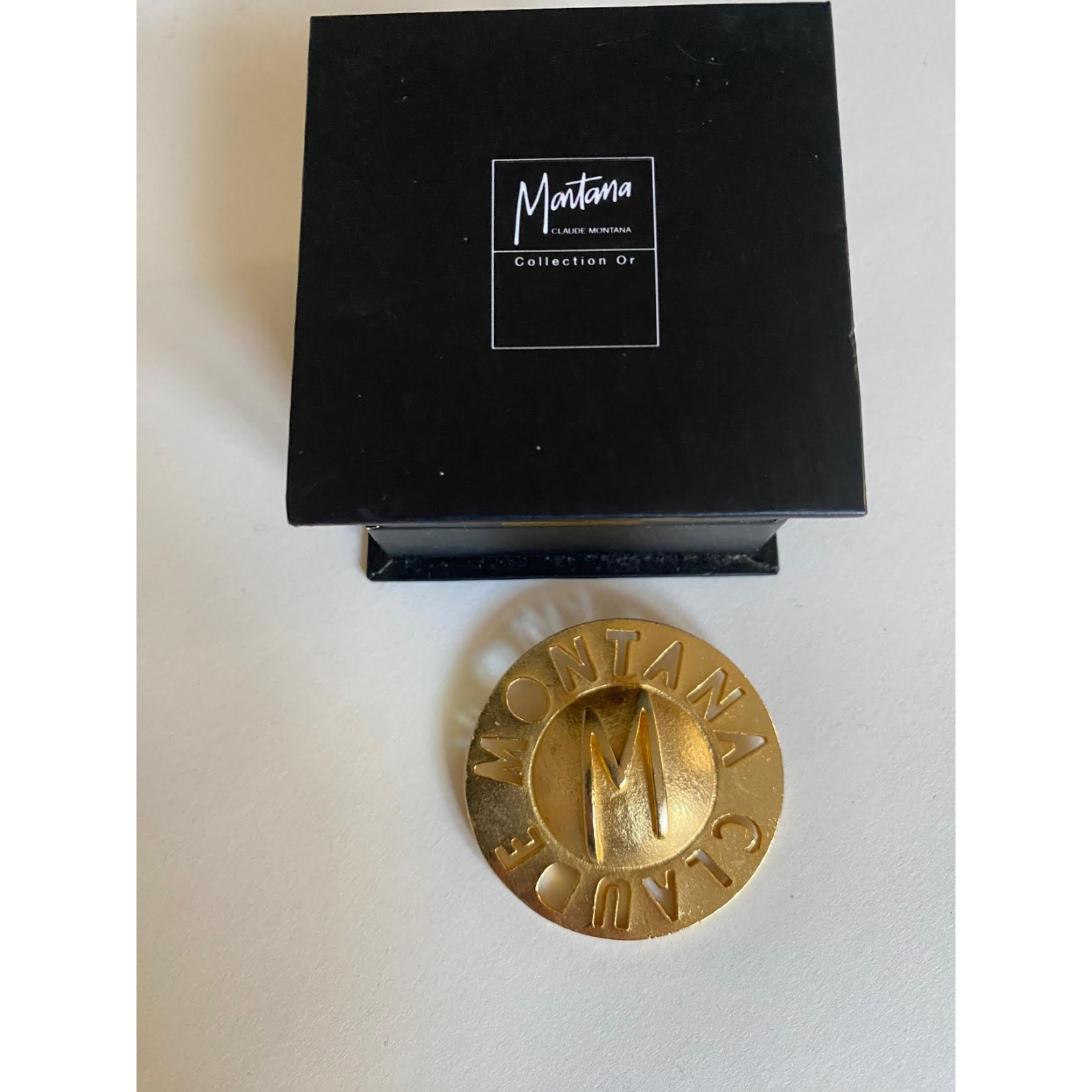 Broszka Claude Montana