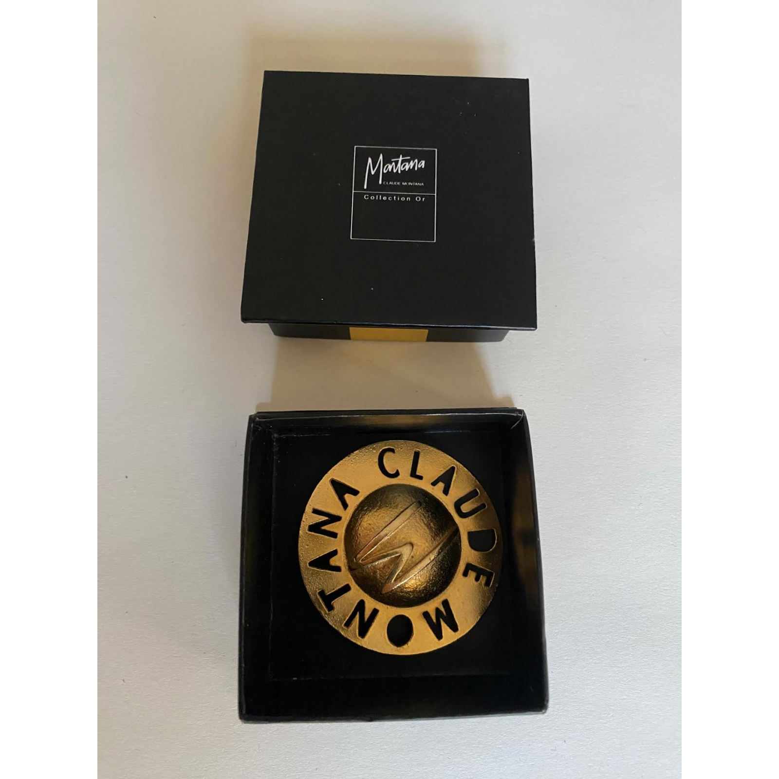 Broszka Claude Montana