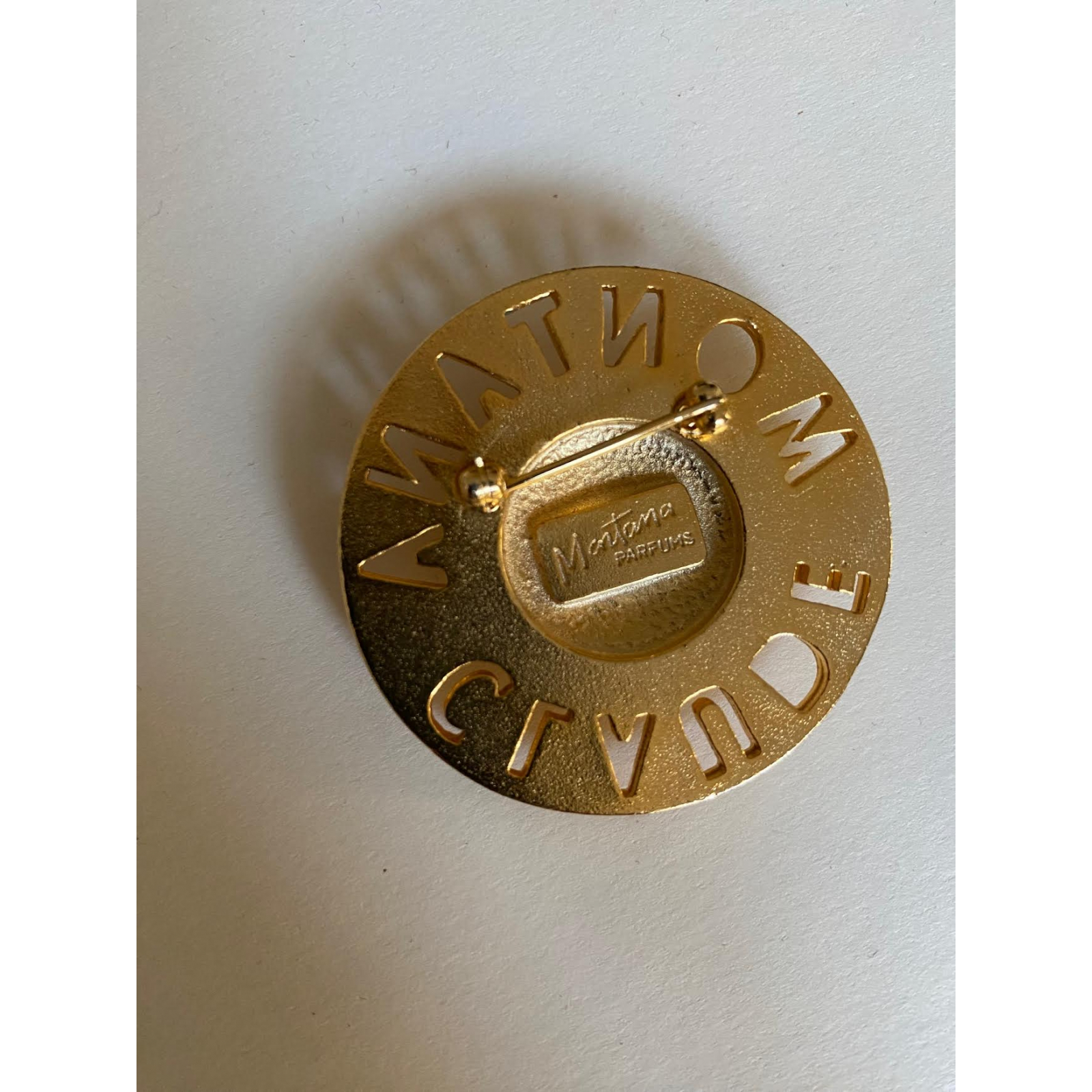 Broszka Claude Montana